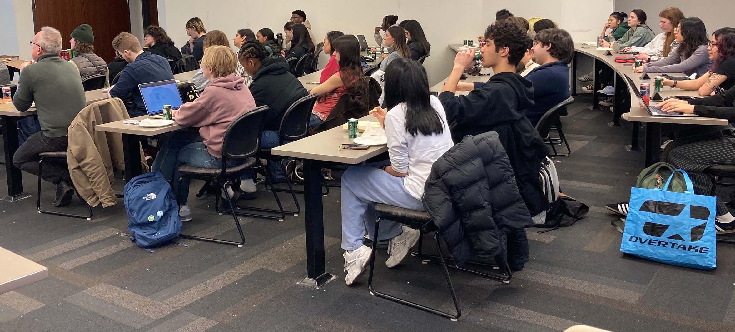 Students listen intently at the 2026 Big Questions Lecture